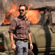 Scoot McNairy and a burning truck